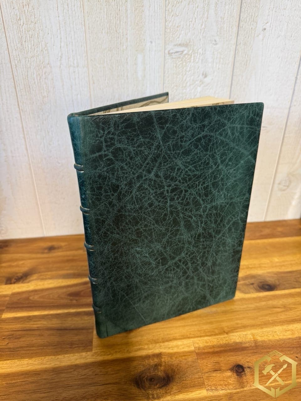 Carnet relié en cuir vert émeraude